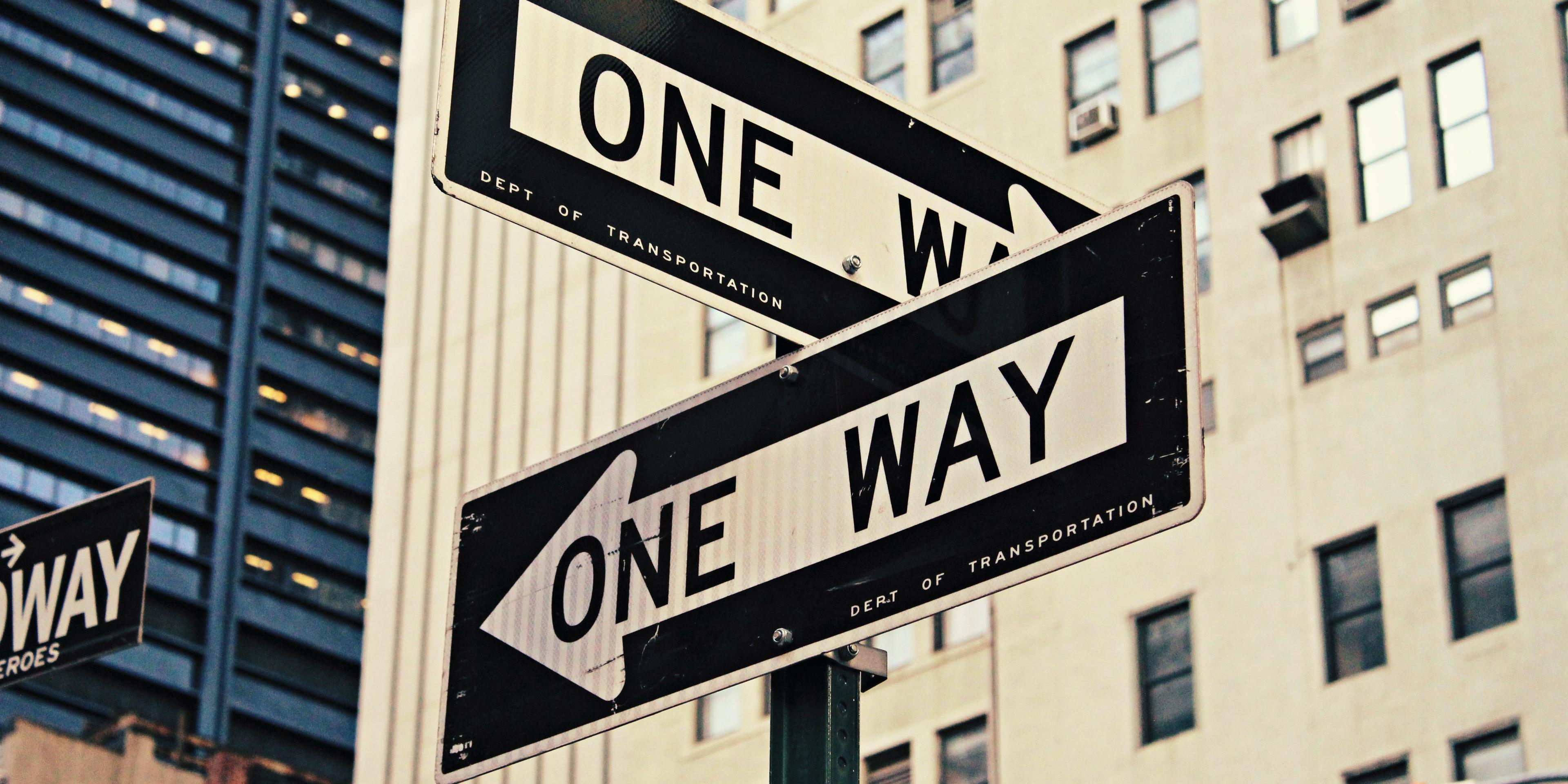 one way sign by @bdchu614 on Unsplash